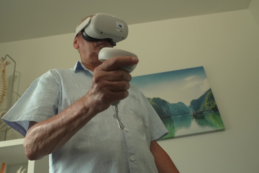 Chronic pain patient wears virtual reality glasses.