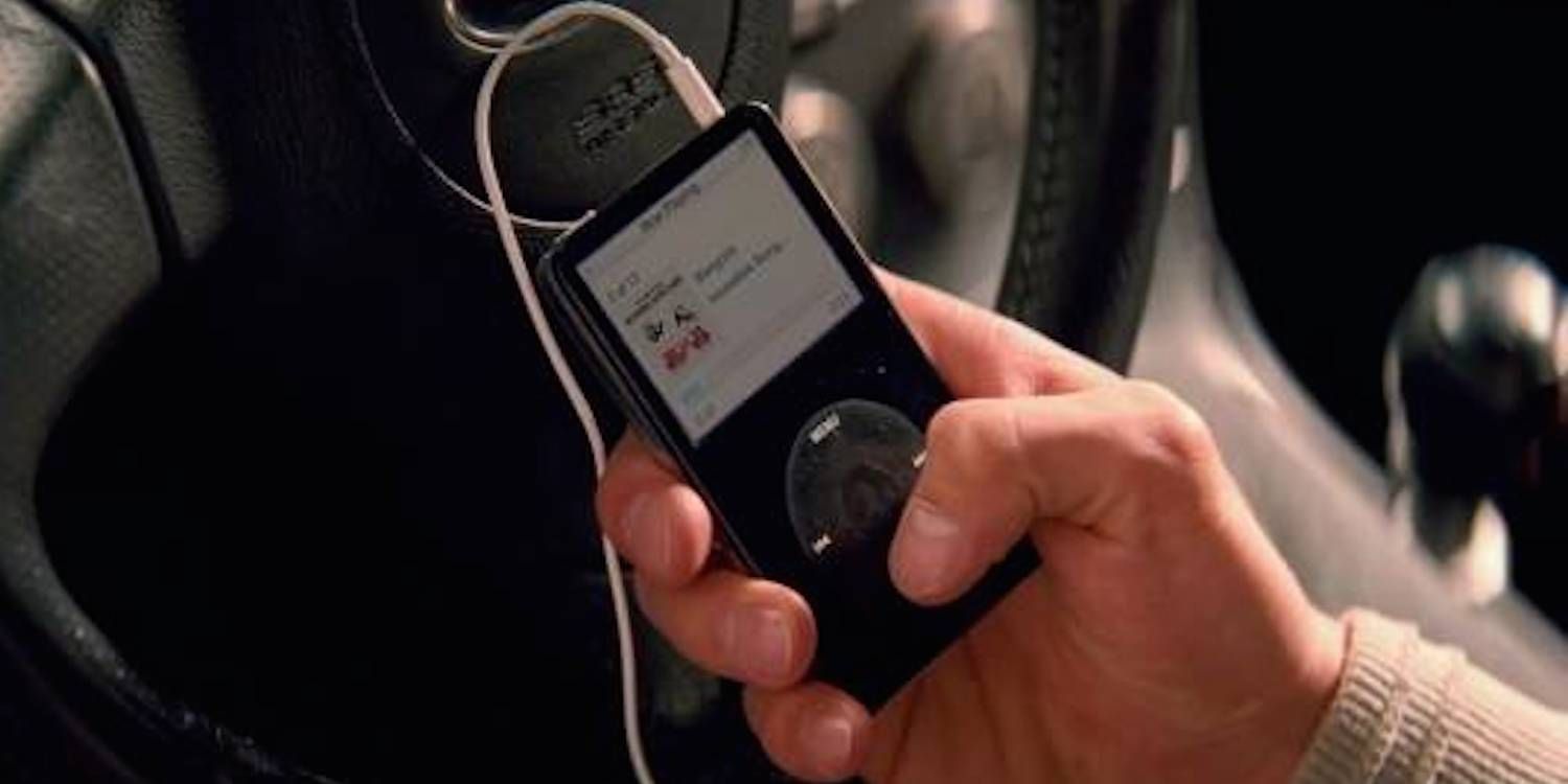 A hand holding an iPod in Baby Driver 