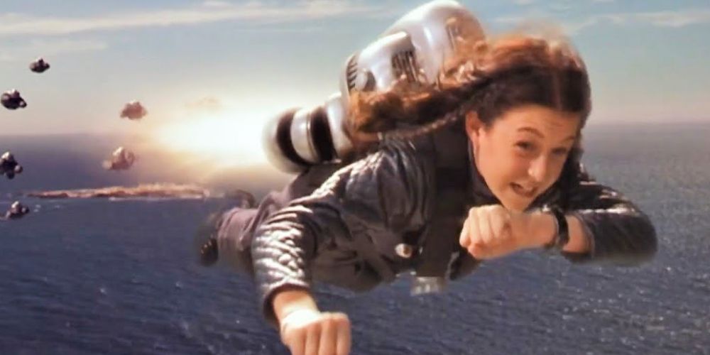 Photo of Carmen flying through the sky with her pack of friends at Spy Kids